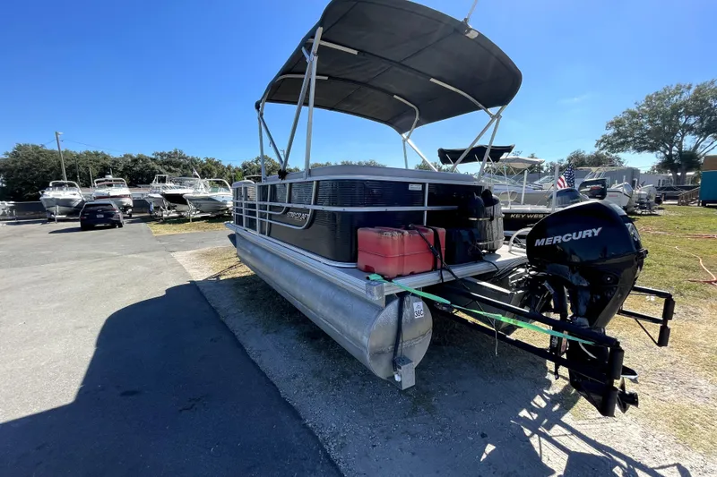 Slide: The Image of 2014 Starcraft Stardeck 190 Cruise pontoon boat with Mercury outboard motor. - 4