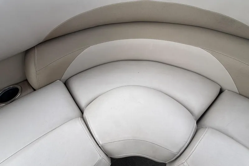 Slide: The Image of 2014 Starcraft Stardeck 190 Cruise boat interior seating with cup holder. - 47