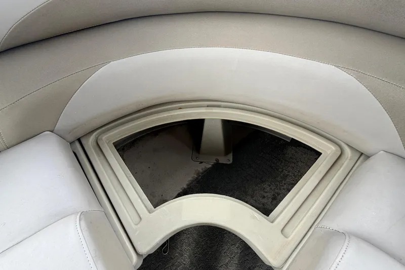 Slide: The Image of 2014 Starcraft Stardeck 190 Cruise boat seating area with storage compartment. - 48