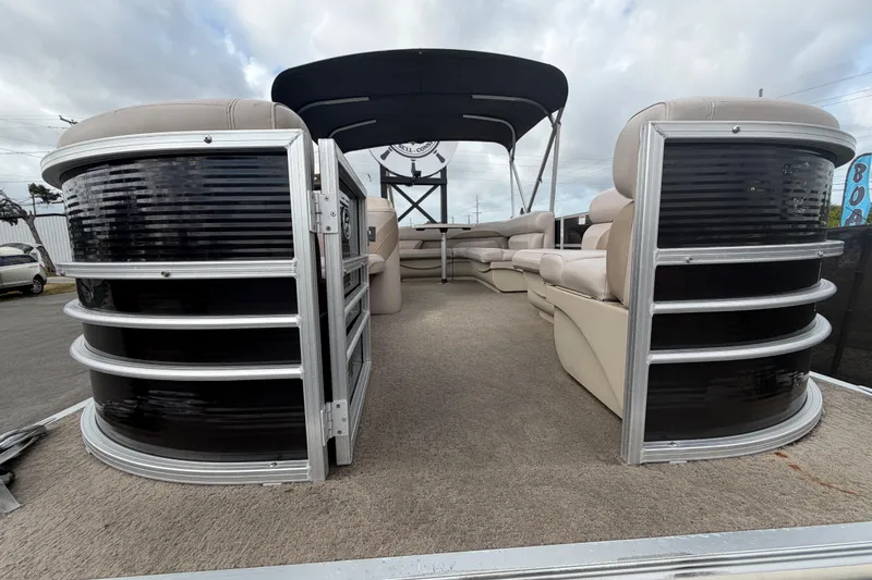 Slide: The Image of 2014 Starcraft Stardeck 190 Cruise pontoon boat with spacious seating and canopy. - 56