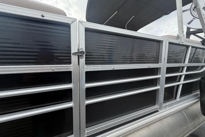 Slide: The Image of 2014 Starcraft Stardeck 190 Cruise pontoon boat with aluminum railing and canopy. - 57