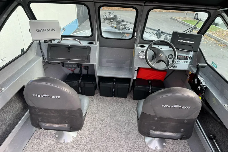 Slide: The Image of Interior of a 2018 Fish Rite 16.5 Stalker boat with Garmin and Humminbird electronics. - 14