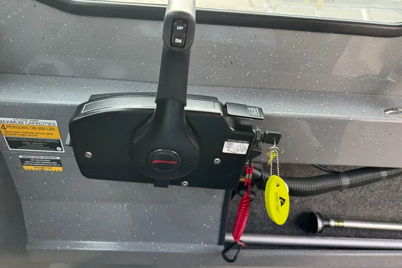 Slide: The Image of Control panel of 2018 Fish Rite 16.5 Stalker boat with Mercury throttle. - 18