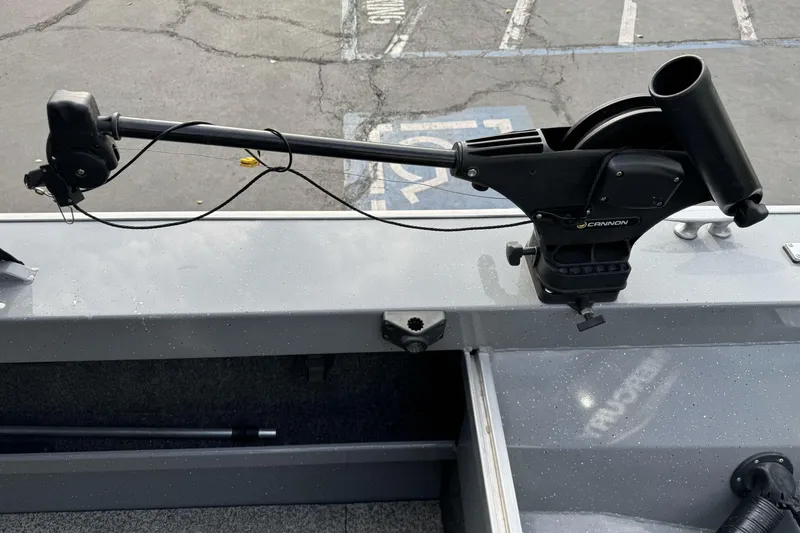 Slide: The Image of 2018 Fish Rite 16.5 Stalker boat with mounted Cannon downrigger. - 22