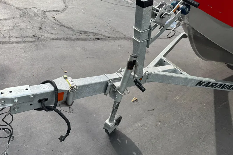 Slide: The Image of Trailer hitch of a 2018 Fish Rite 16.5 Stalker boat on a Karavan trailer. - 3