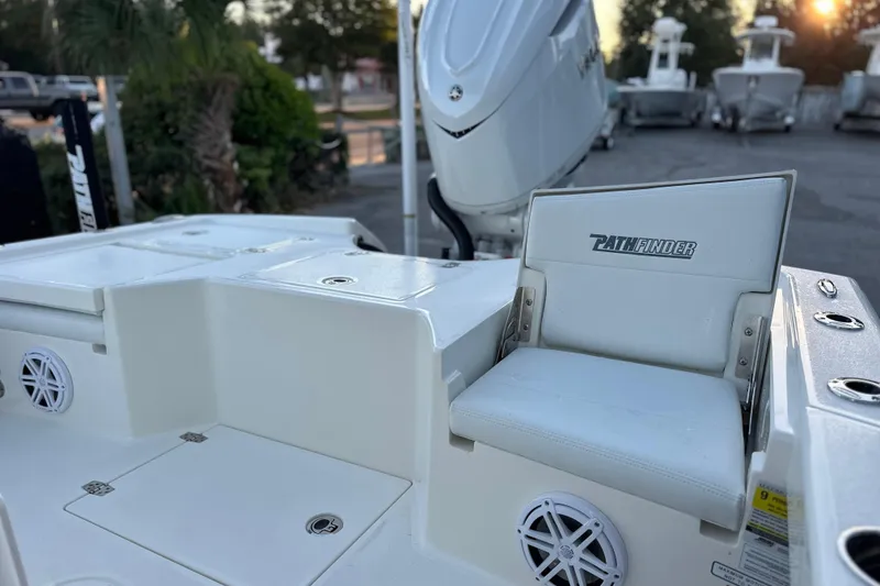 Slide: The Image of 2026 Pathfinder 2500 Hybrid boat seat and deck, featuring sleek design and modern amenities. - 11