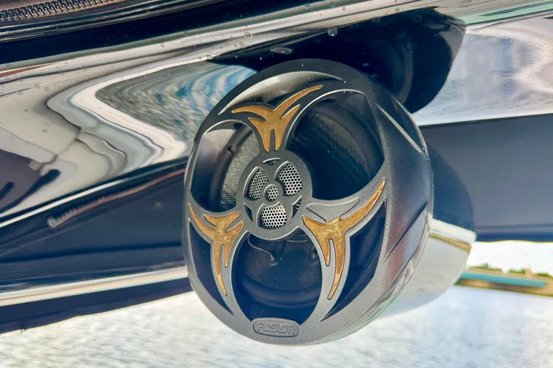 Slide: The Image of Close-up of a Fusion marine speaker on a 2013 Regal 21 OBX boat. - 15