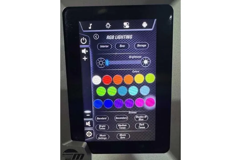 Slide: The Image of Touchscreen displaying RGB lighting controls in a 2022 Malibu M240 boat. - 10