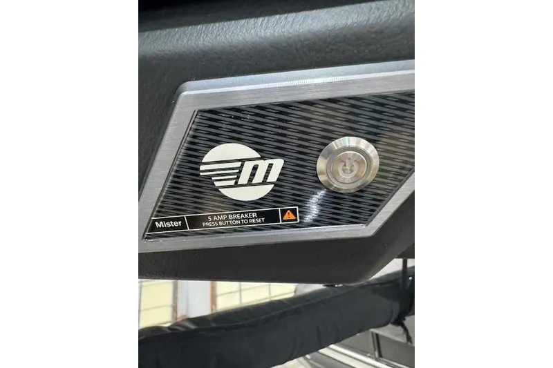 Slide: The Image of 2022 Malibu M240 control panel with 5 amp breaker reset button. - 8