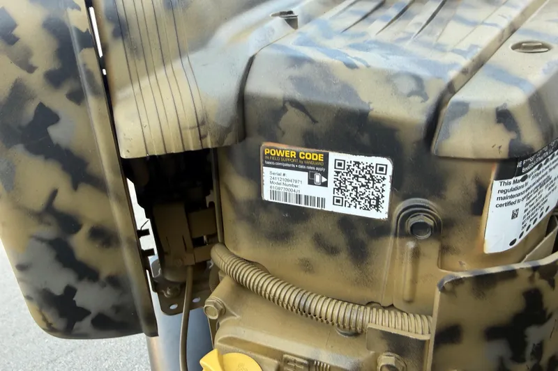 Slide: The Image of Camouflage engine detail of 2025 Diamondback Mud Rattler 1860 with QR code and labels. - 9