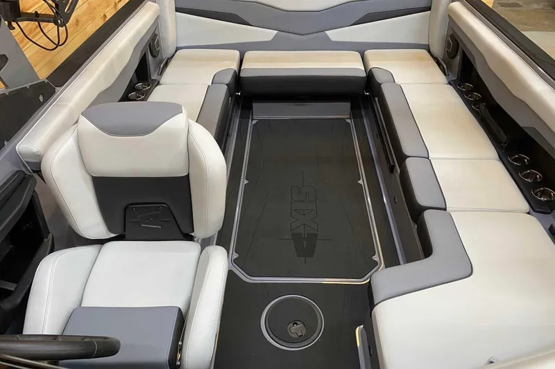 Slide: The Image of 2024 Axis T235 boat interior with spacious seating and modern design. - 7