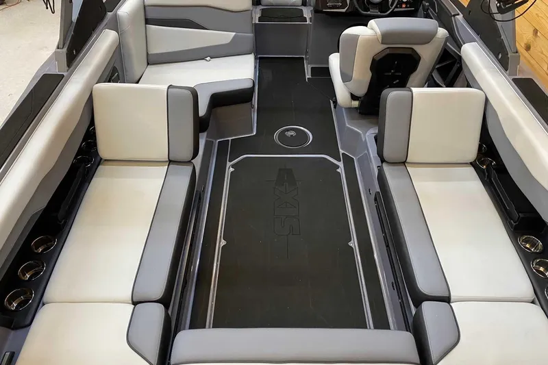 Slide: The Image of 2024 Axis T235 boat interior with sleek seating and modern design. - 8