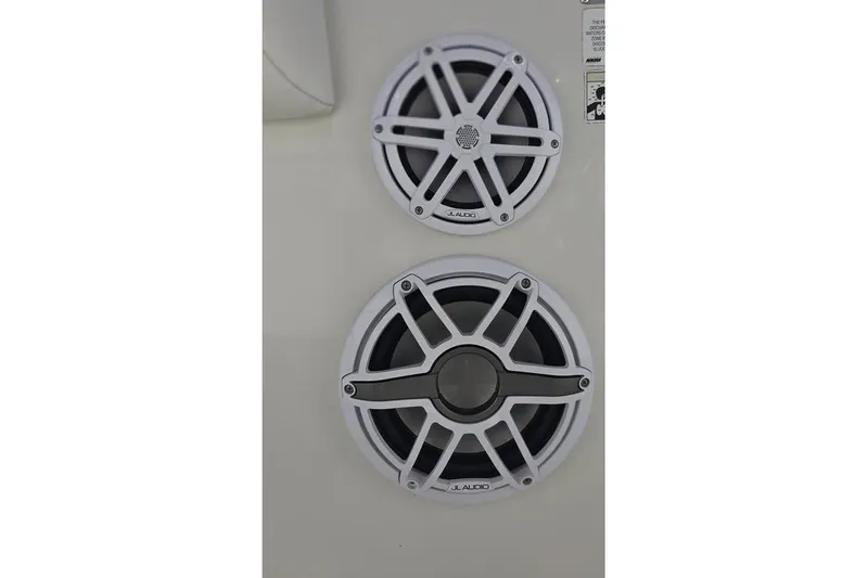 Slide: The Image of Speakers on 2013 Sailfish 320 CC boat, featuring JL Audio marine sound system. - 24