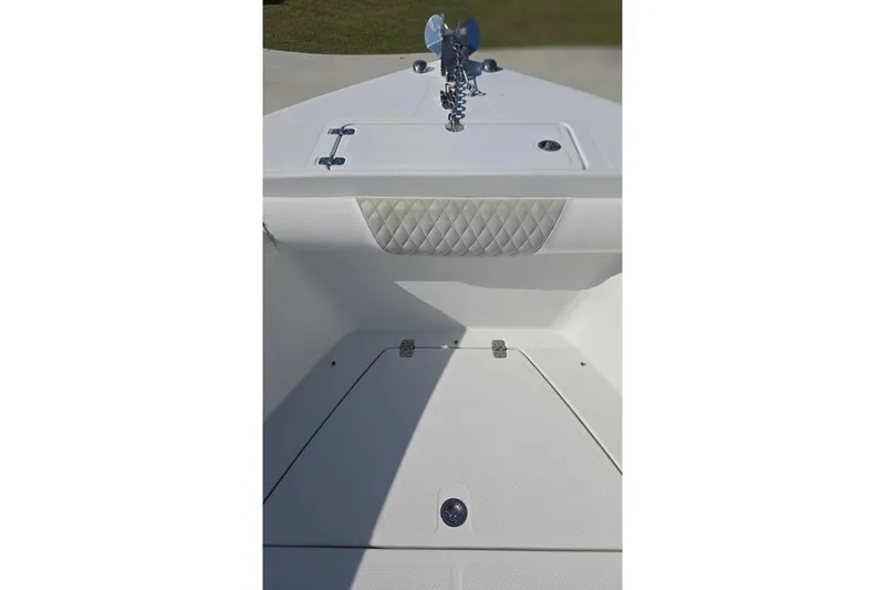 Slide: The Image of Bow area of 2013 Sailfish 320 CC boat with anchor and storage compartment. - 35
