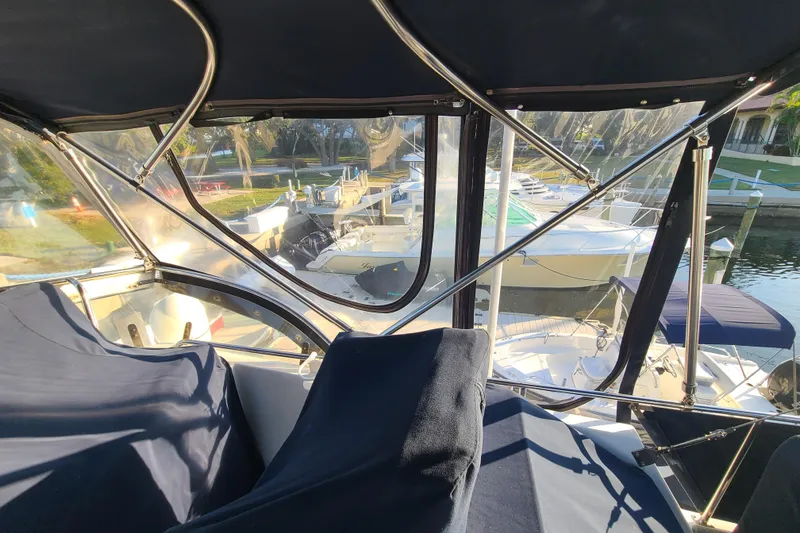 Slide: The Image of Interior view of a 2000 Grand Banks 46 Classic yacht at a marina. - 35