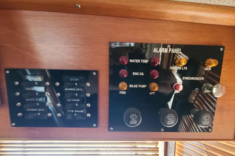 Slide: The Image of Control and alarm panels on a 2000 Grand Banks 46 Classic yacht. - 38