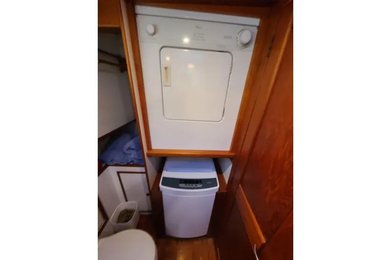 Slide: The Image of Laundry area in 2000 Grand Banks 46 Classic yacht with washer and dryer. - 61
