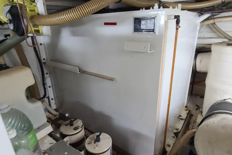 Slide: The Image of Engine room of 2000 Grand Banks 46 Classic yacht with mechanical components. - 80