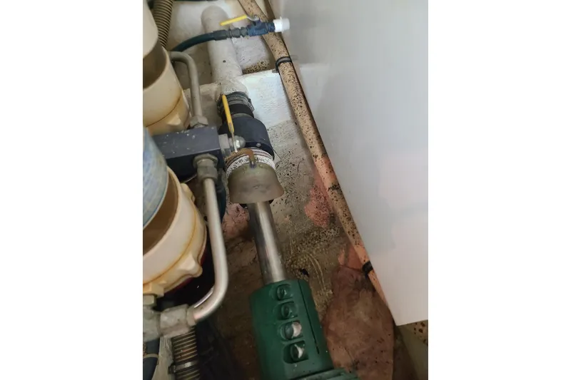 Slide: The Image of Engine room components of a 2000 Grand Banks 46 Classic yacht. - 89