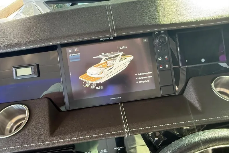 Slide: The Image of Dashboard of 2018 Sae Ray 38SLV OB boat with Raymarine display. - 18