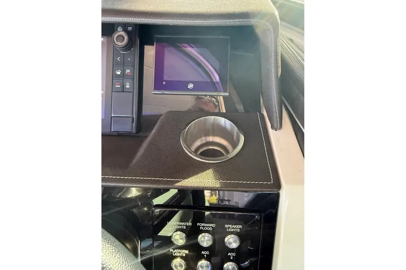 Slide: The Image of Dashboard of 2018 Sae Ray 38SLV OB with control panel and cup holder. - 20