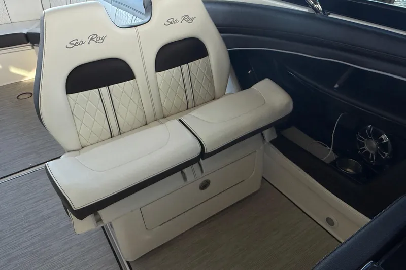 Slide: The Image of Luxurious seating on 2018 Sea Ray 38SLV OB boat, featuring rotating elegant design and comfort. - 23