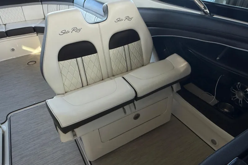 Slide: The Image of 2018 Sea Ray 38SLV OB boat interior with luxurious seating and modern design. - 24