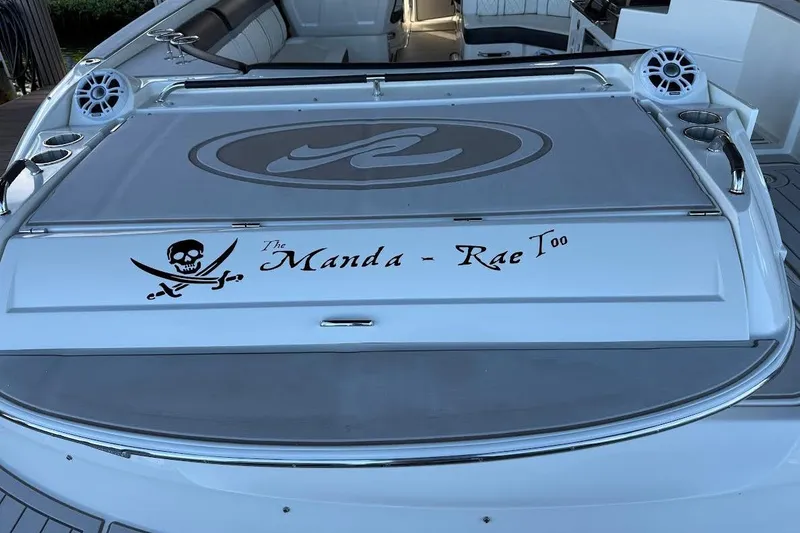 Slide: The Image of 2018 Sae Ray 38SLV OB boat with custom pirate-themed nameplate "The Manda - Rae Too." - 3