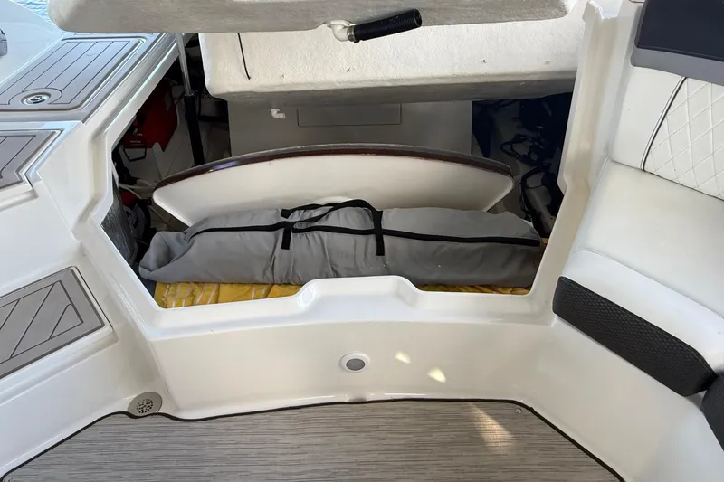 Slide: The Image of Storage compartment in a 2018 Sea Ray 38SLV OB boat with gear and equipment. - 32