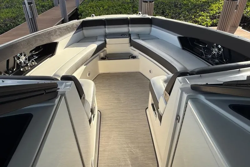 Slide: The Image of Luxurious interior of 2018 Sea Ray 38SLV OB boat with plush seating. - 34