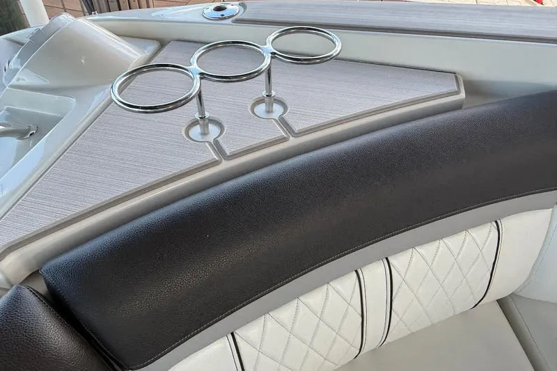 Slide: The Image of Interior of 2018 Sae Ray 38SLV OB boat with cup holders and quilted seating. - 43