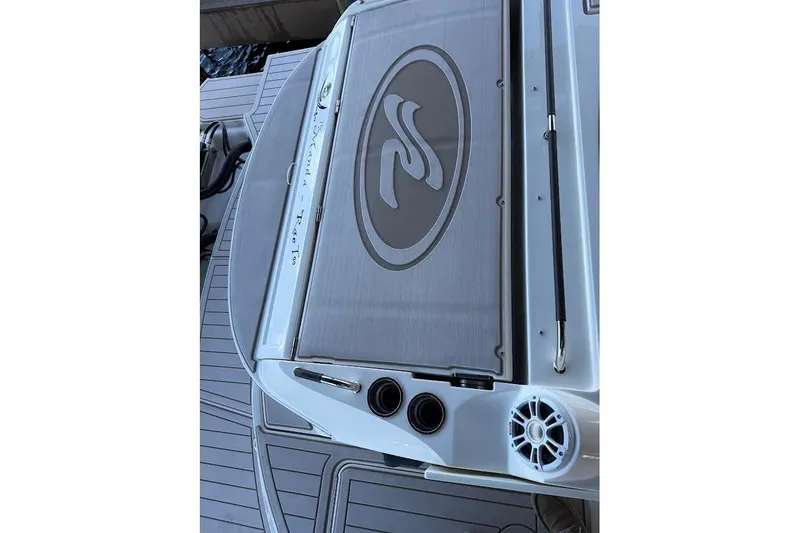 Slide: The Image of 2018 Sae Ray 38SLV OB boat deck with logo and speaker detail. - 44
