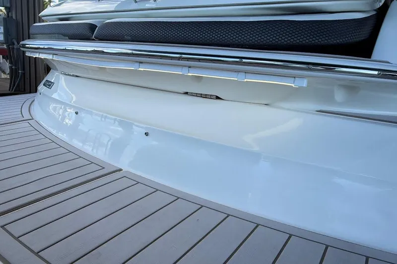 Slide: The Image of 2018 Sae Ray 38SLV OB boat with sleek white deck and chrome railing. - 50