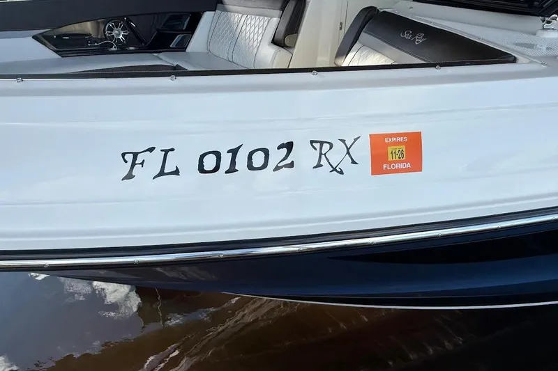 Slide: The Image of 2018 Sae Ray 38SLV OB boat with Florida registration and expiration sticker. - 53
