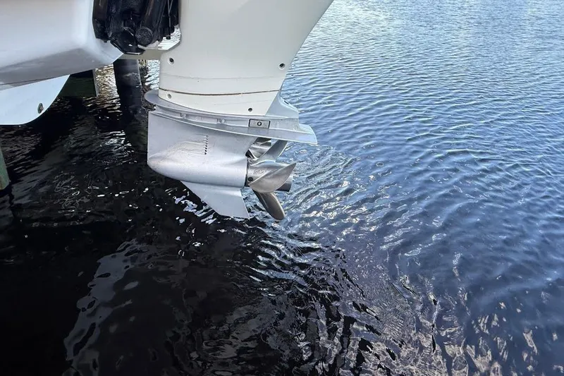 Slide: The Image of 2018 Sae Ray 38SLV OB outboard motor propeller above water surface. - 55