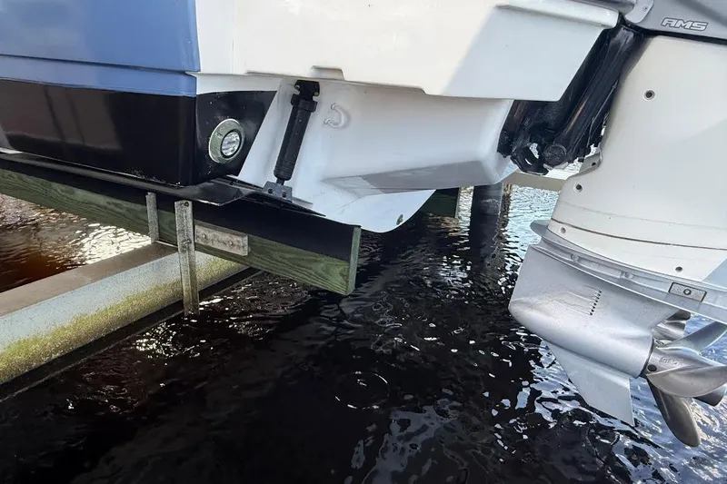 Slide: The Image of 2018 Sae Ray 38SLV OB boat engine and hull above water. - 56