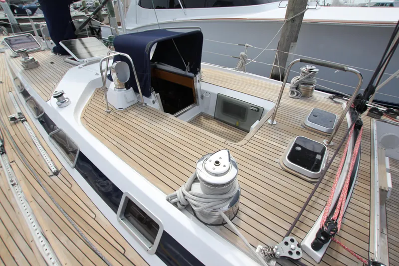 Slide: The Image of Deck of 1989 Nautor Swan 53 sailboat with teak finish and winches. - 10