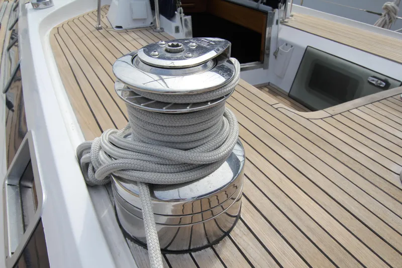 Slide: The Image of Winch on teak deck of 1989 Nautor Swan 53 sailboat. - 20