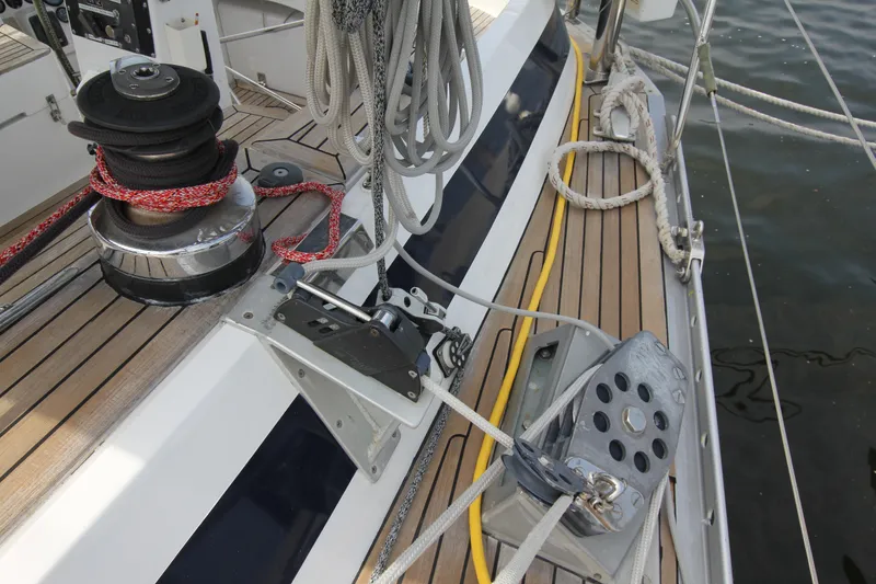 Slide: The Image of Deck of 1989 Nautor Swan 53 sailboat with winch and ropes. - 21
