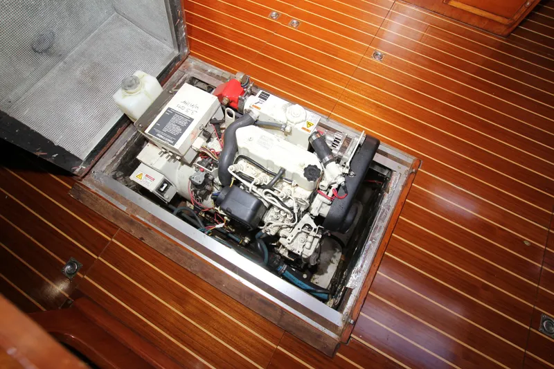 Slide: The Image of Engine compartment of 1989 Nautor Swan 53 yacht with wooden flooring. - 42