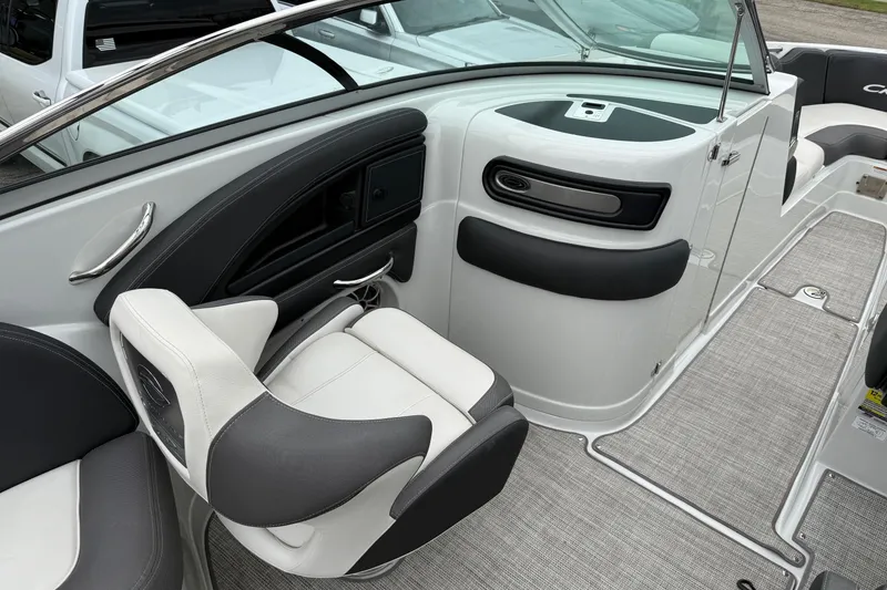 Slide: The Image of 2022 Crownline 255 SS boat interior with sleek seating and modern design. - 10