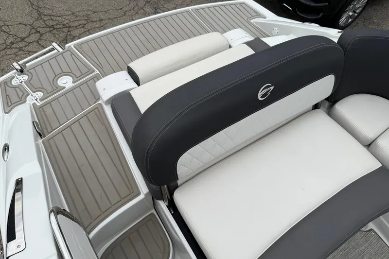 Slide: The Image of 2022 Crownline 255 SS boat interior with stylish seating and deck design. - 13