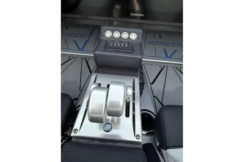 Slide: The Image of 2025 Nor-Tech 4000 Roadster boat on trailer, dual outboard motors visible. - 13