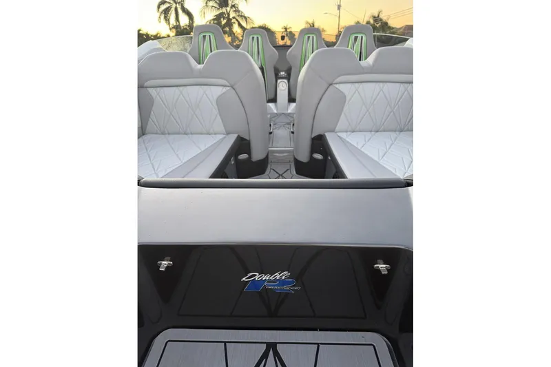 Slide: The Image of Nor-Tech 4000 Roadster 2025 interior with green accents and sleek design. - 18