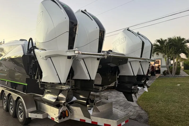 Slide: The Image of 2026 Nor-Tech 4000 Roadster with powerful outboard engines on a trailer. - 16