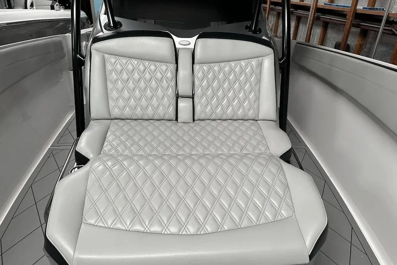 Slide: The Image of Luxurious seating on 2017 Nor-Tech 340 Sport Center Console with diamond-stitched upholstery. - 13
