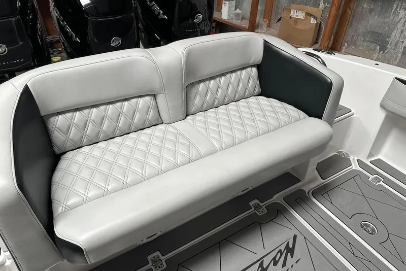 Slide: The Image of 2017 Nor-Tech 340 Sport Center Console with diamond-stitched seating and Mercury engines. - 14