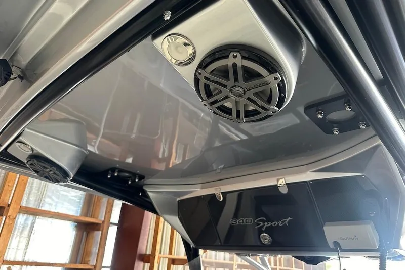 Slide: The Image of 2017 Nor-Tech 340 Sport Center Console with JL Audio speaker and Garmin equipment. - 6