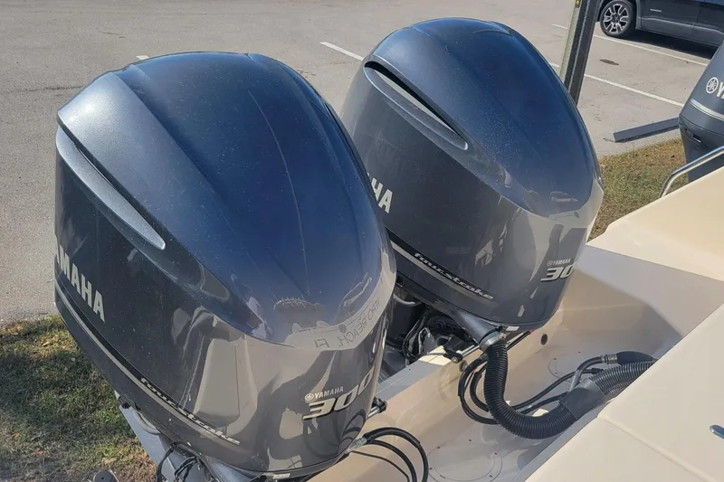 Slide: The Image of Twin Yamaha outboard engines on a 2019 Grady-White Canyon 306 boat. - 5