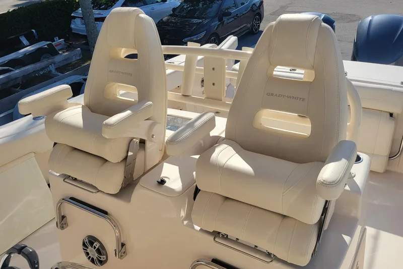 Slide: The Image of 2019 Grady-White Canyon 306 boat seats, luxurious white leather design. - 9